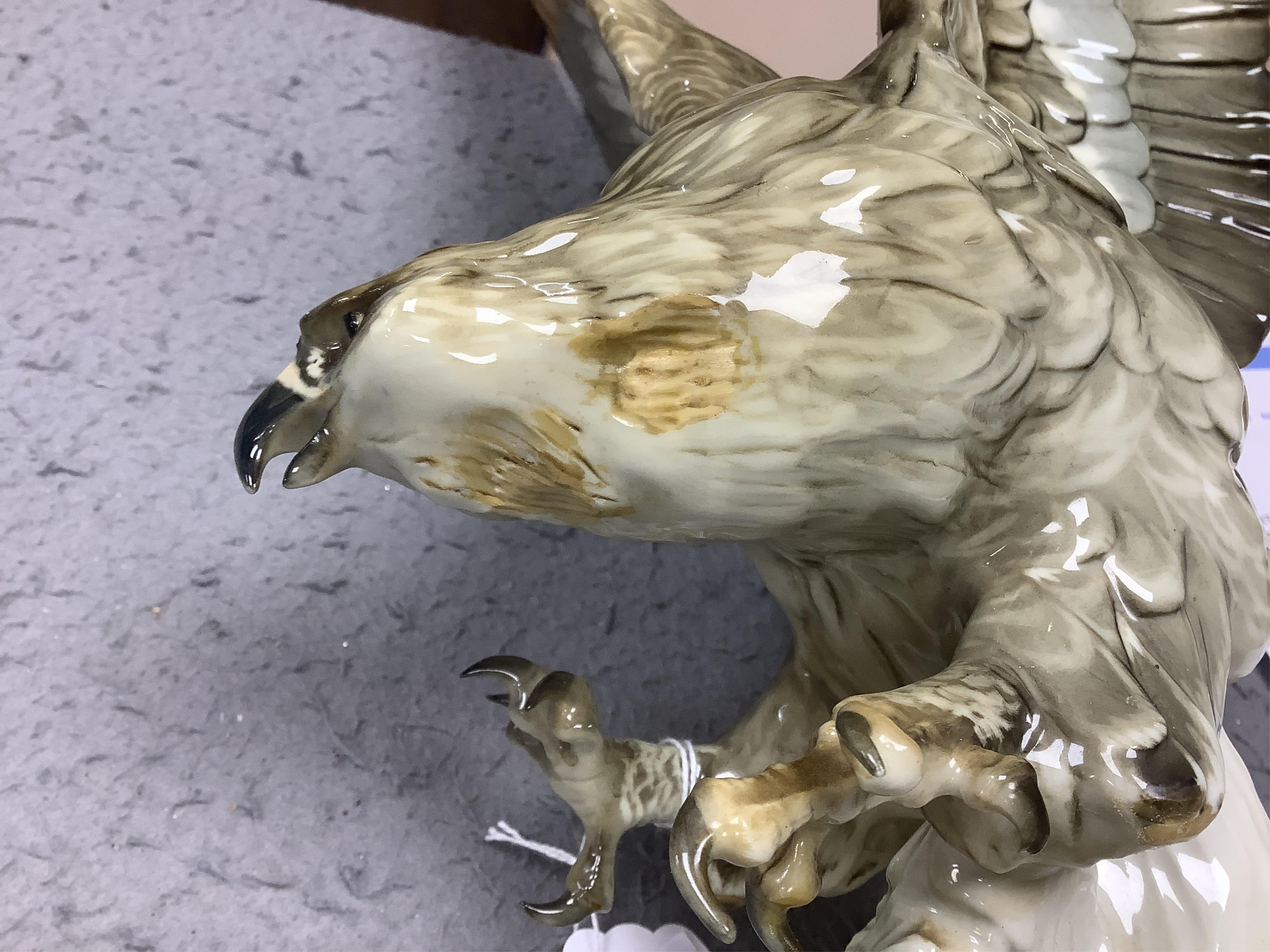 Karl Tutter (1883-1969) for Kutschenreuther, a porcelain model of a hawk, 42cm. Condition - restoration? otherwise good